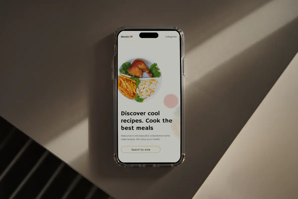 A phone showing the mealsoff website
